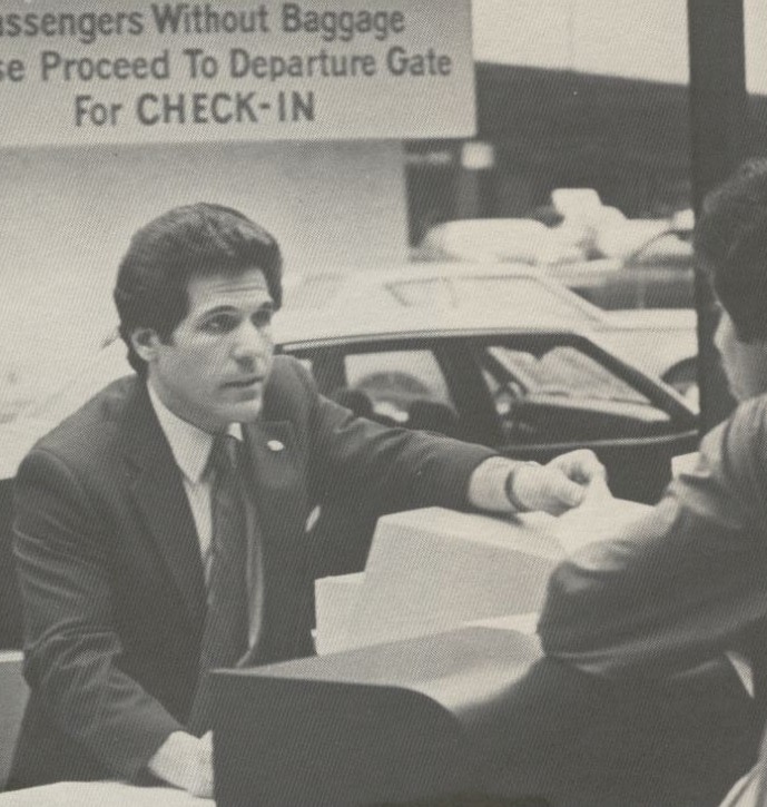 1981 Passenger Service Agent Louis Mannarino checking-in customers at Pan Am's WorldPort Terminal at New York, JFK Airport.